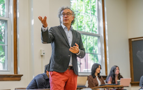 David Alvarez teaches students in a classroom