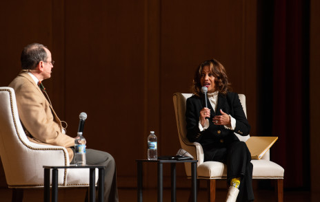 Dr. White speaks on stage