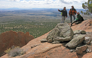 Jim and students on near vertical Entrada Sandstone associated with the Mt. Hillers laccolithic intrusion.