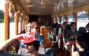 The DePauw group traveling by riverboat on the Mekong Delta.
