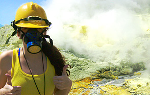 Katherine R. Shover '14 poses inside a volcanic crater.