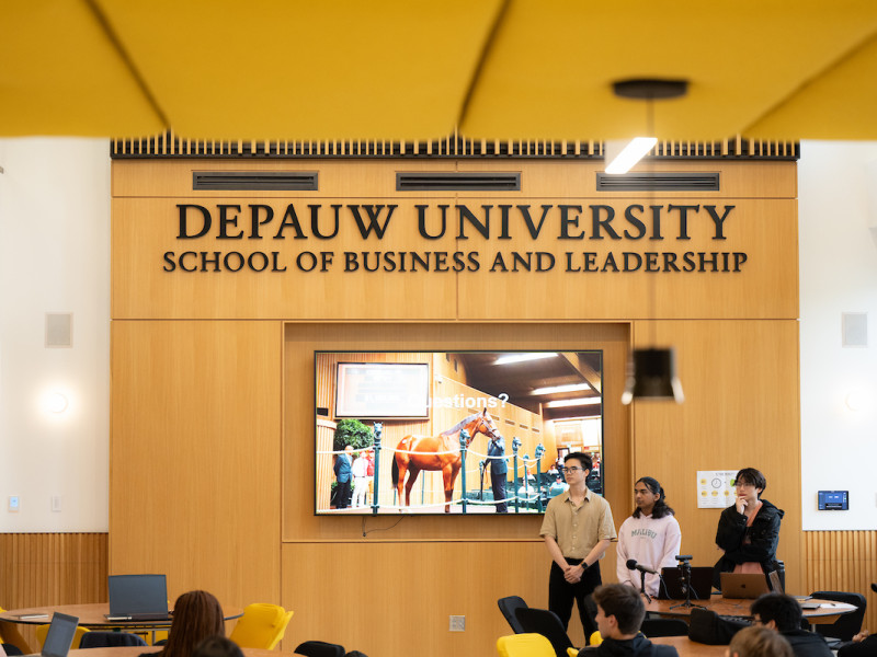 Students presenting in DePauw School of Business and Leadership room