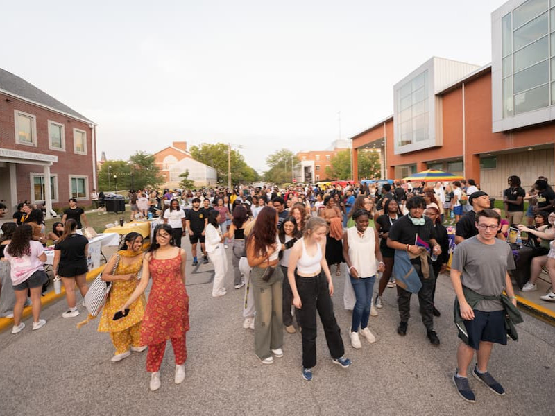 Students gathered for an outdoor block party on campus