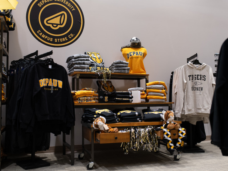 University branded sweatshirts and tiger plush toys on display
