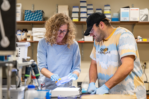 Professor and a student working in a lab